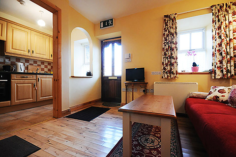 Mount Brandon Cottage, Cloghane. County Kerry | Living Room / Kitchen