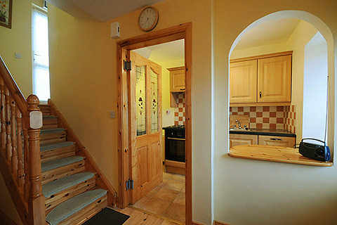 Mount Brandon Cottage, Cloghane. County Kerry | Serving Window into Kitchen