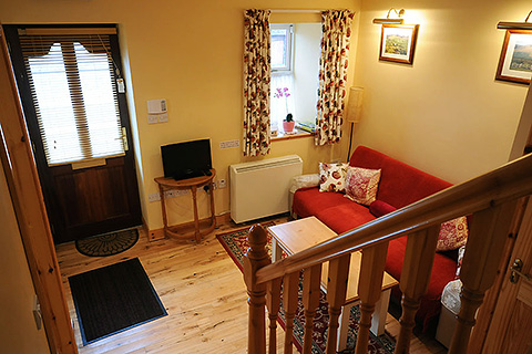 Mount Brandon Cottage, Cloghane. County Kerry | Descending from Bedroom to the Living Room